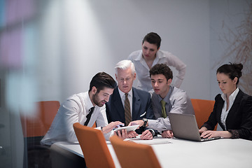 Image showing business people group on meeting at modern startup office