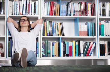 Image showing female student study in library