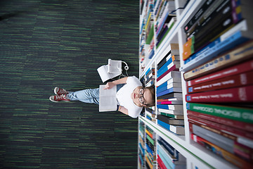 Image showing female student study in library
