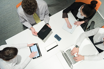 Image showing aerial view of business people group brainstorming on meeting