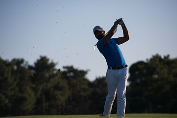 Image showing golfer hitting long shot