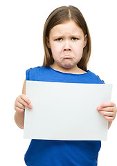 Image showing Little girl is holding blank banner