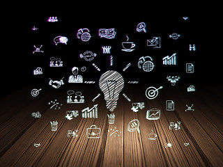 Image showing Finance concept: Light Bulb in grunge dark room