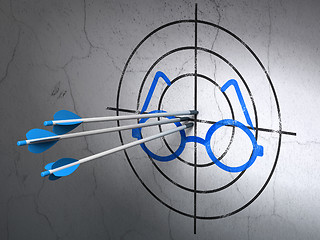 Image showing Learning concept: arrows in Glasses target on wall background