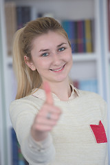 Image showing portrait of female student in library