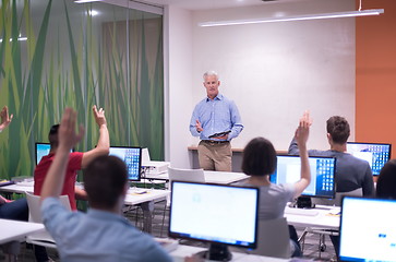 Image showing teacher and students in computer lab classroom