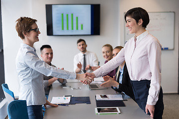 Image showing business womans handshake