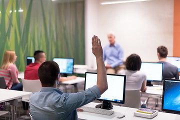 Image showing student answering a question in classroom