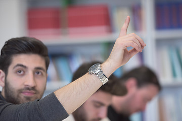 Image showing group of students  raise hands up