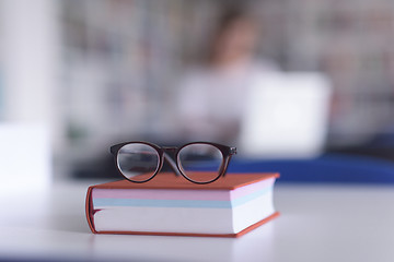 Image showing female student study in school library