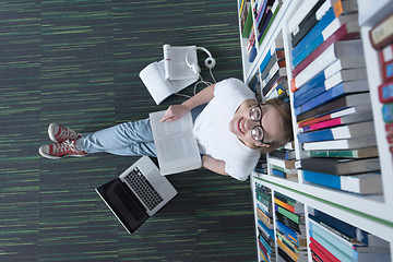 Image showing female student study in library