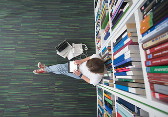 Image showing female student study in library