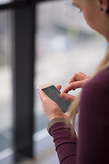 Image showing business woman using smart phone at office