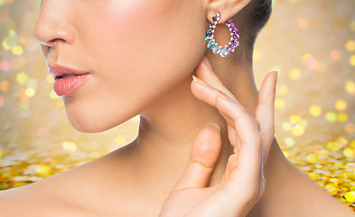 Image showing close up of beautiful woman face with earring