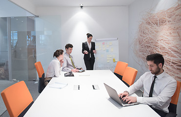 Image showing young business man at meeting