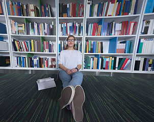 Image showing female student study in library