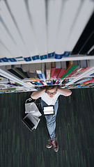 Image showing female student study in library