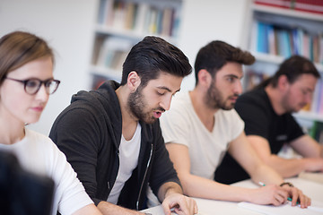 Image showing group of students study together in classroom