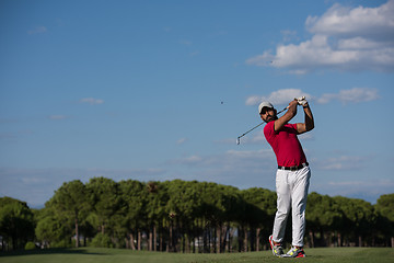 Image showing golf player hitting long shot