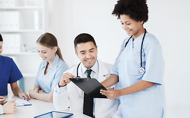 Image showing group of happy doctors meeting at hospital office