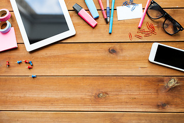 Image showing close up of school supplies and tablet pc