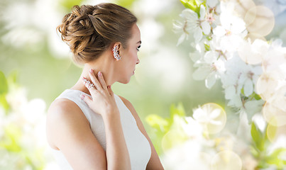 Image showing close up of beautiful woman with ring and earring