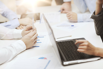 Image showing close up of files and laptop computer in office