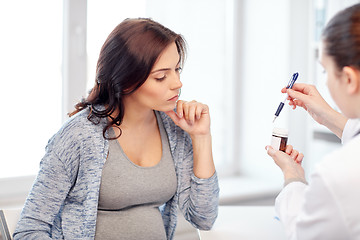 Image showing gynecologist doctor and pregnant woman at hospital