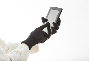 Image showing Hands in Gloves Touching the Screen