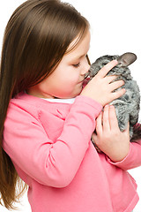 Image showing Little girl with chinchilla