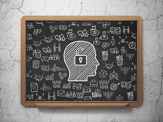 Image showing Business concept: Head With Padlock on School board background