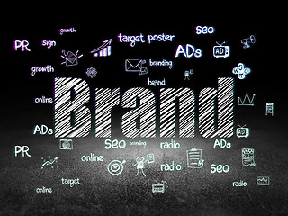 Image showing Marketing concept: Brand in grunge dark room