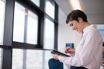 Image showing business woman on meeting  using tablet