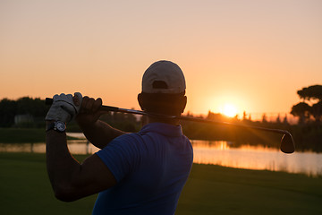 Image showing golfer hitting long shot