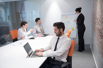 Image showing young business man at meeting