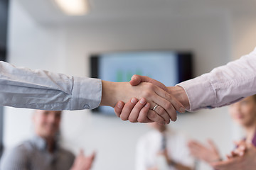 Image showing business womans handshake