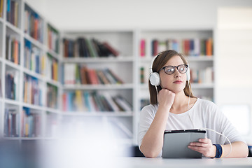 Image showing female student study in library