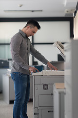 Image showing young  business man copy documents