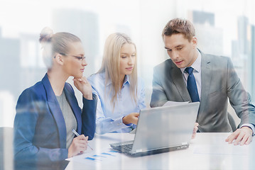 Image showing business team with laptop having discussion