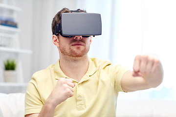 Image showing young man in virtual reality headset or 3d glasses