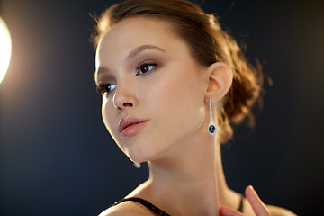 Image showing beautiful young asian woman with earring