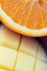 Image showing close up of fresh juicy orange and mango slices
