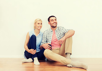 Image showing happy couple of man and woman to new home