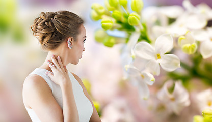 Image showing close up of beautiful woman with ring and earring