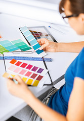 Image showing woman working with color samples for selection