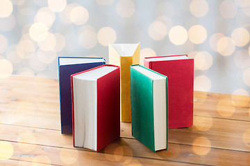 Image showing close up of books on wooden table