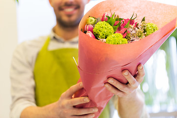 Image showing close up of florist with bunch at flower shop