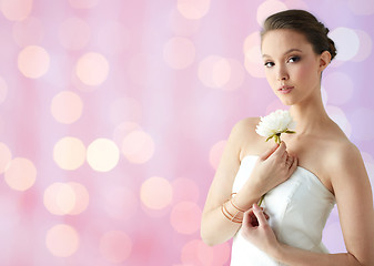 Image showing beautiful asian woman with flower and jewelry