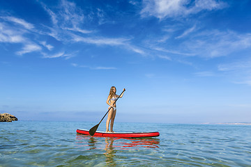 Image showing Woman practicing paddle