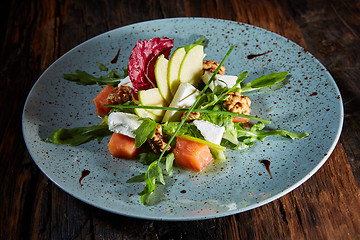 Image showing Homemade salad with apple and salmon